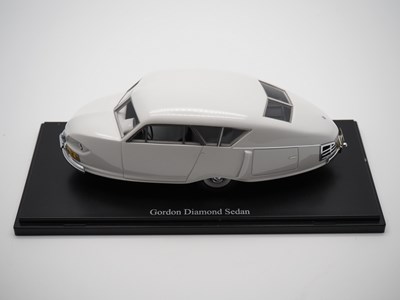 Lot 209 - A pair of 1:43 scale hand built resin models...