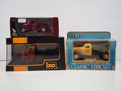 Lot 221 - A group of 1:43 scale models to include ERTL...