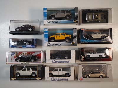 Lot 232 - A group of boxed and 2 unboxed 1:43 scale...