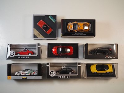 Lot 261 - A group of 1:43 scale boxed and unboxed models...