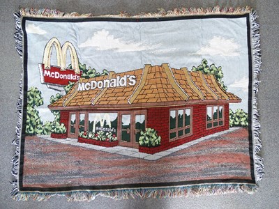 Lot 258 - MCDONALDS: A woven throw / blanket with image...