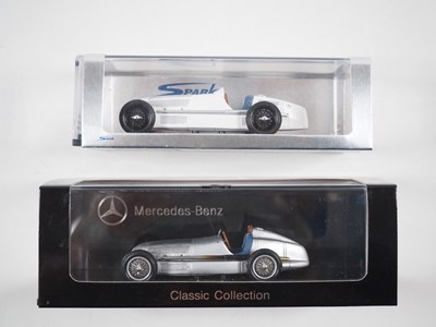 Lot 450 - A pair of 1:43 scale hand built resin models...