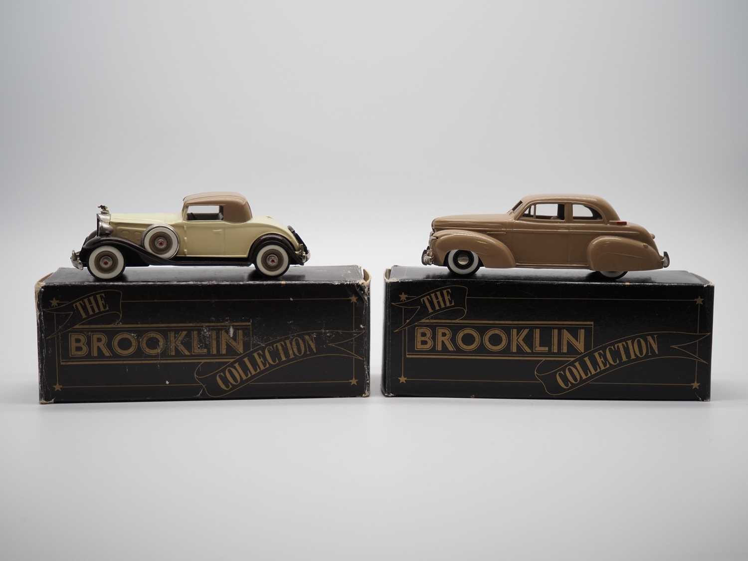 Lot 93 - A pair of 1:43 scale hand built white metal...