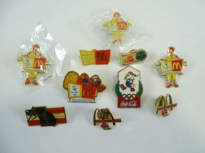 Lot 300 - A group of MCDONALDS sports related pins...