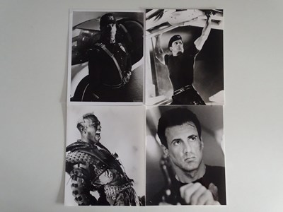 Lot 318 - A group of film stills for DEMOLITION MAN...