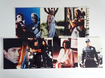 Lot 318 - A group of film stills for DEMOLITION MAN...