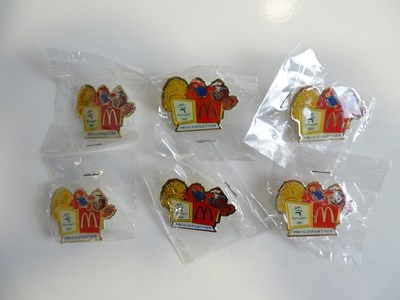 Lot 303 - A group of 6 'Proud Partner' MCDONALDS pins -...