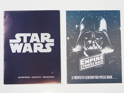 Lot 347 - STAR WARS - A pair of UK pressbooks for STAR...