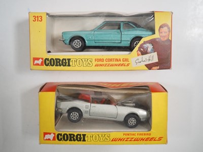 Lot 101 - A pair of CORGI toys comprising of 313 Ford...