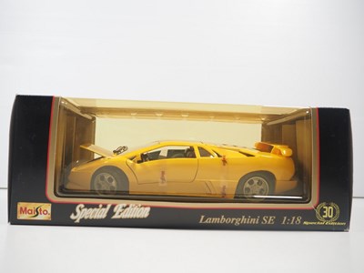 Lot 147 - A group of 1:18 scale diecast cars by BBURAGO...