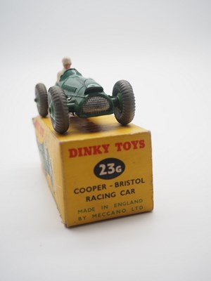 Lot 178 - A pair of DINKY toys racing cars comprising a...