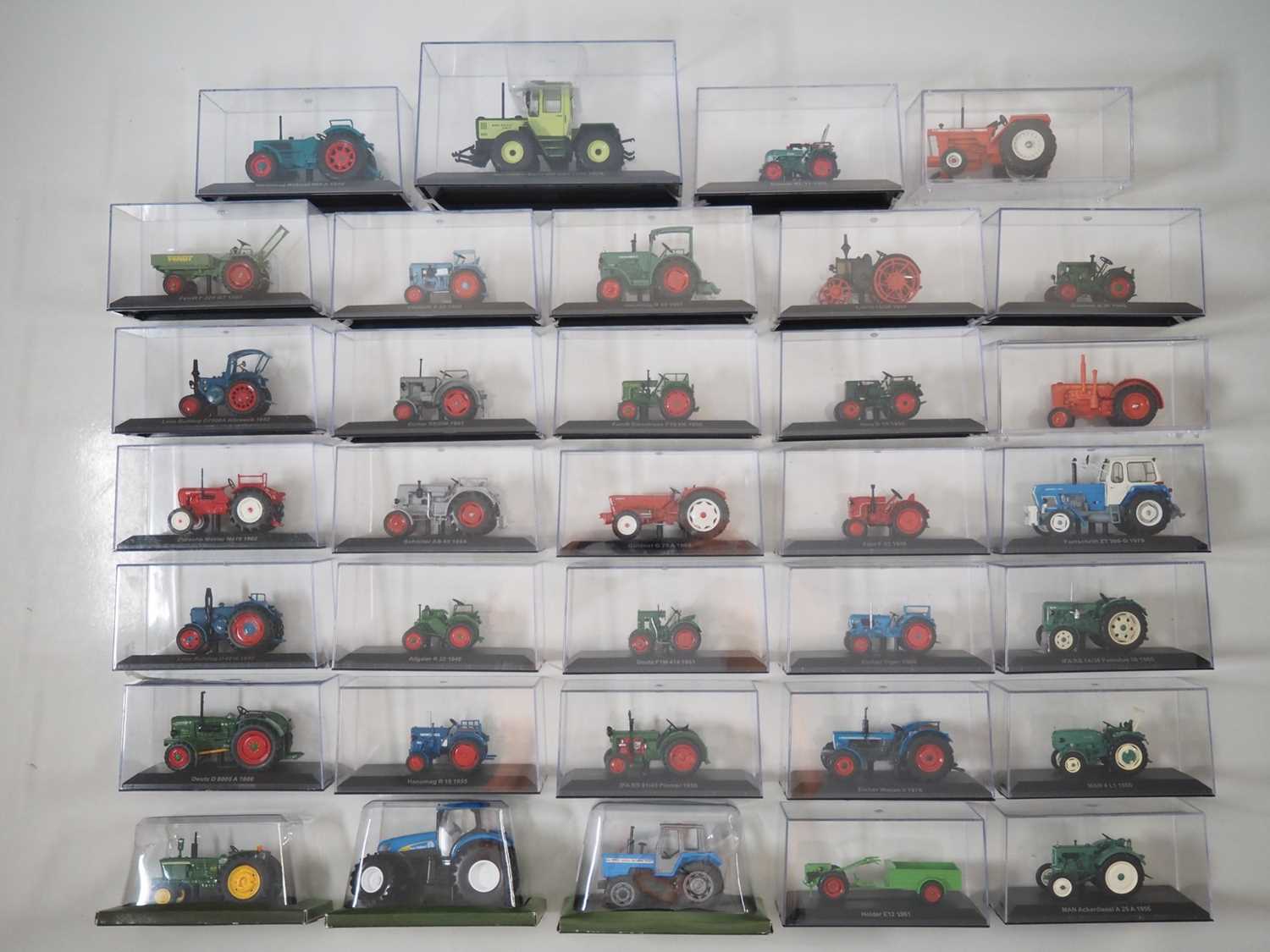 Lot 19 - A quantity of diecast tractor models, most...