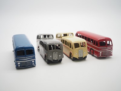 Lot 190 - A group of unboxed DINKY coaches comprising a...