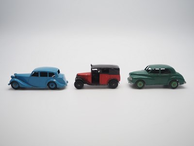 Lot 193 - A group of DINKY cars comprising a 140a (106)...