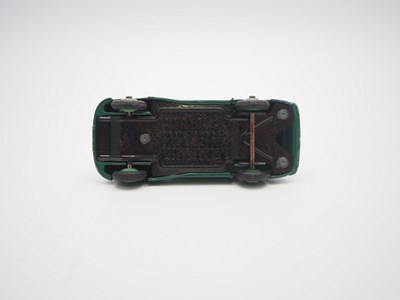 Lot 193 - A group of DINKY cars comprising a 140a (106)...