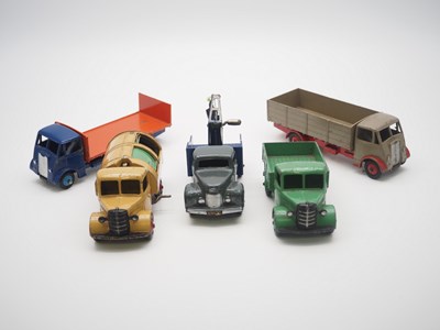 Lot 198 - A group of DINKY trucks comprising a 433 Guy...