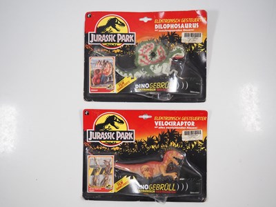 Lot 242 - A pair of carded Jurassic Park dinosaurs by...