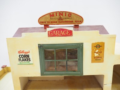 Lot 247 - A TRI-ANG MINIC wooden No.4 garage in good...