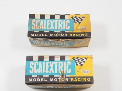 Lot 268 - A pair of TRI-ANG SCALEXTRIC Formula One cars,...