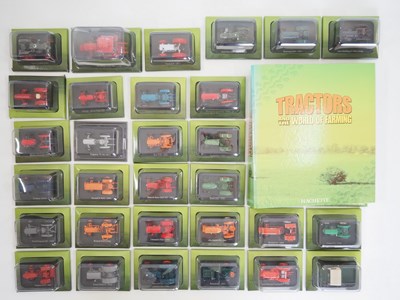 Lot 29 - A group of 1:43 scale diecast tractors by...