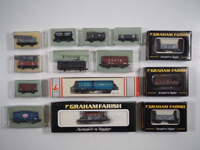 Lot 292 - A group of N gauge wagons by FARISH, PECO and...