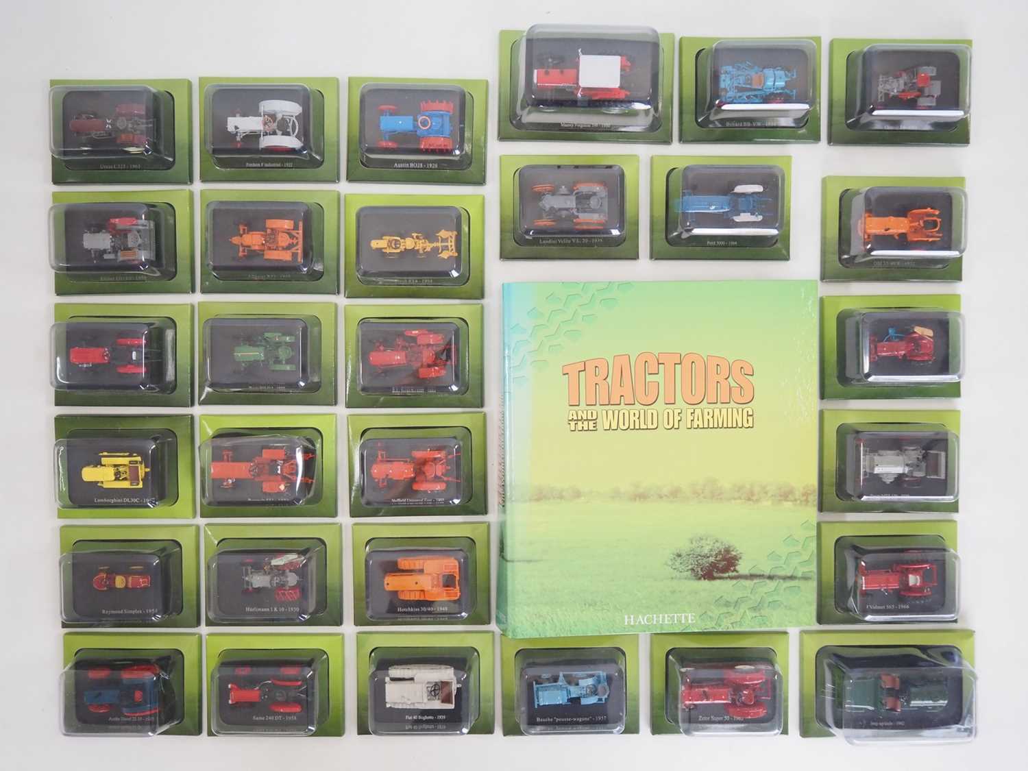 Lot 30 - A group of 1:43 scale diecast tractors by...