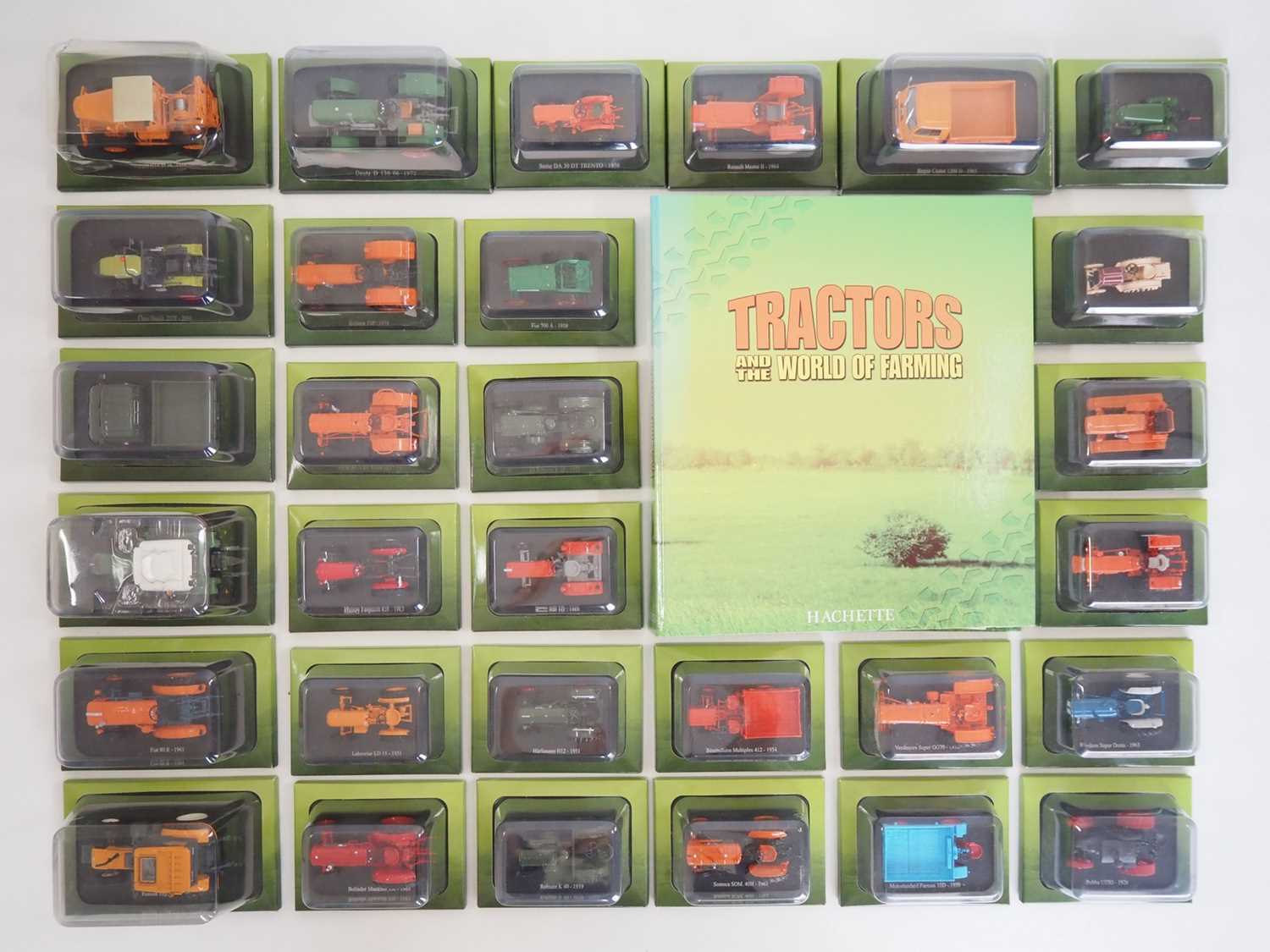 Lot 31 - A group of 1:43 scale diecast tractors by...