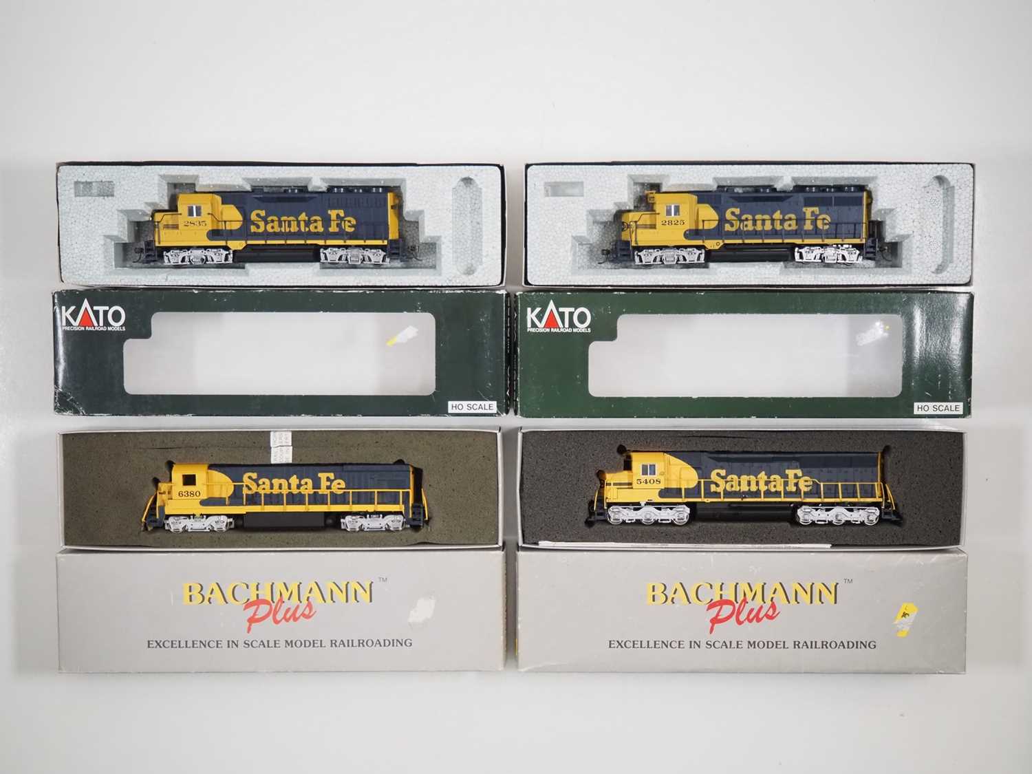 Lot 411 - A pair of KATO American outline HO gauge GP35...