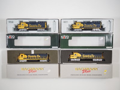 Lot 411 - A pair of KATO American outline HO gauge GP35...