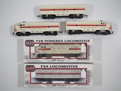 Lot 418 - A group of American outline HO gauge boxed and...