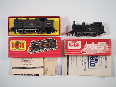 Lot 494 - A pair of HORNBY DUBLO 2-rail OO gauge steam...