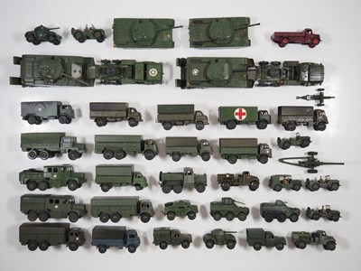 Lot 57 - A large group of playworn DINKY military...