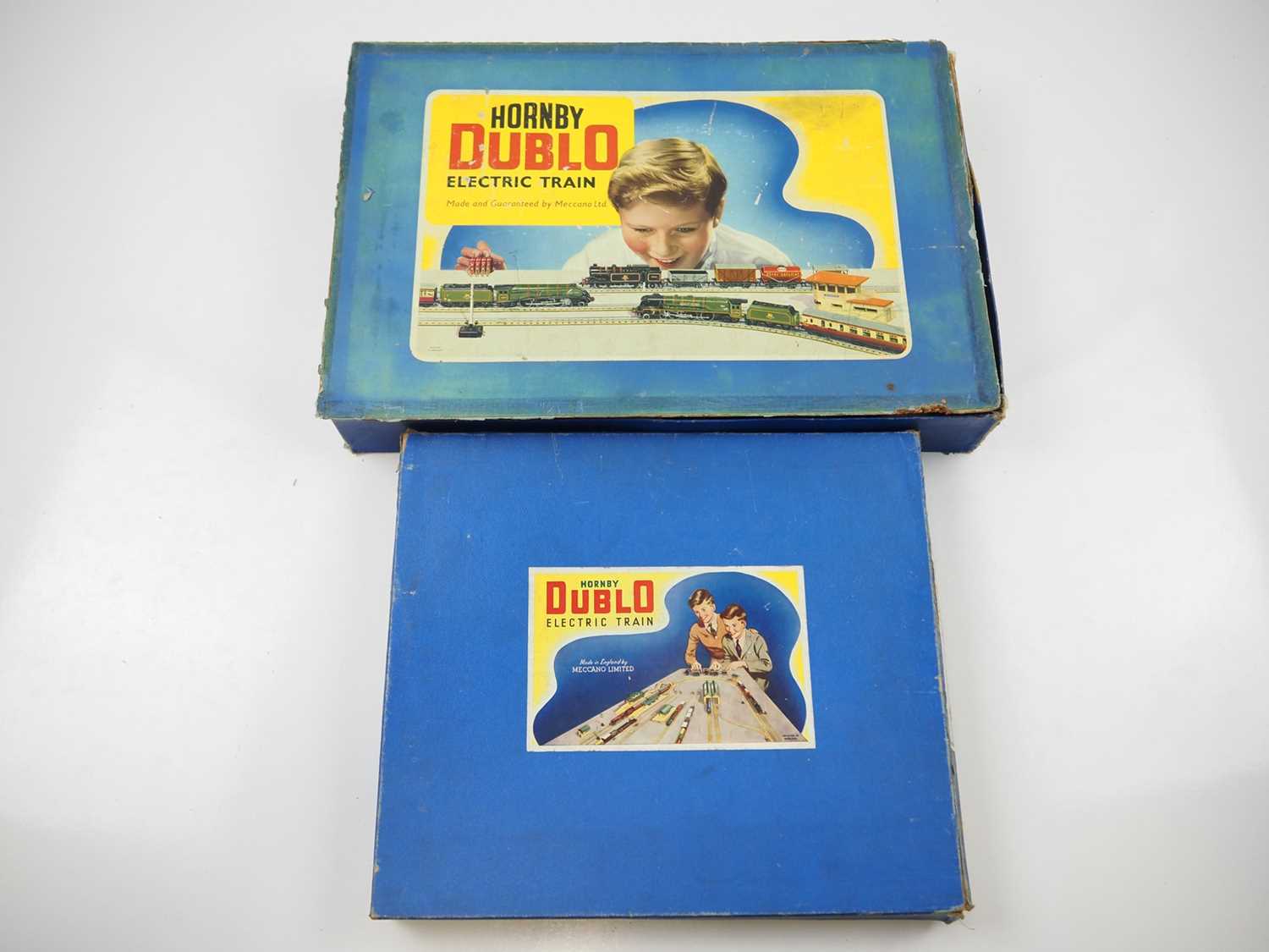 Lot 572 - A pair of HORNBY DUBLO 3-rail train sets...