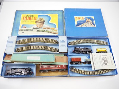 Lot 572 - A pair of HORNBY DUBLO 3-rail train sets...