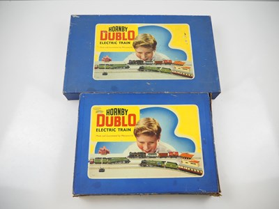 Lot 573 - A pair of HORNBY DUBLO 3-rail train sets...