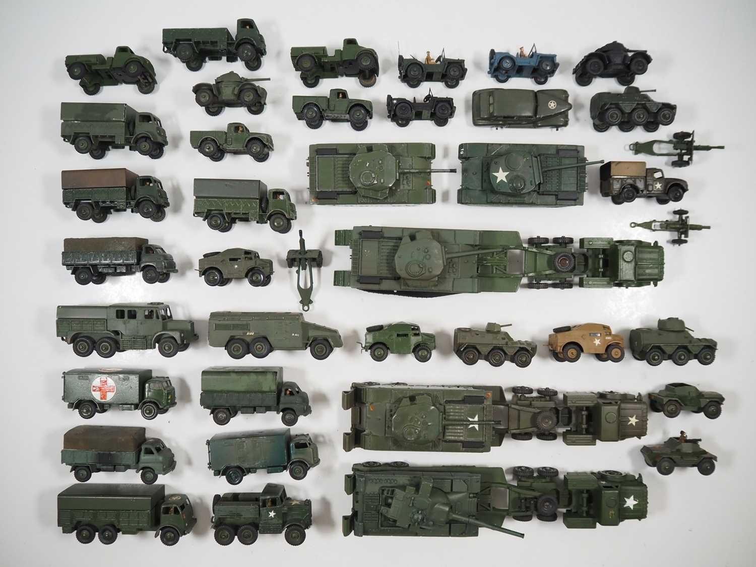 Lot 58 - A large group of playworn DINKY military...