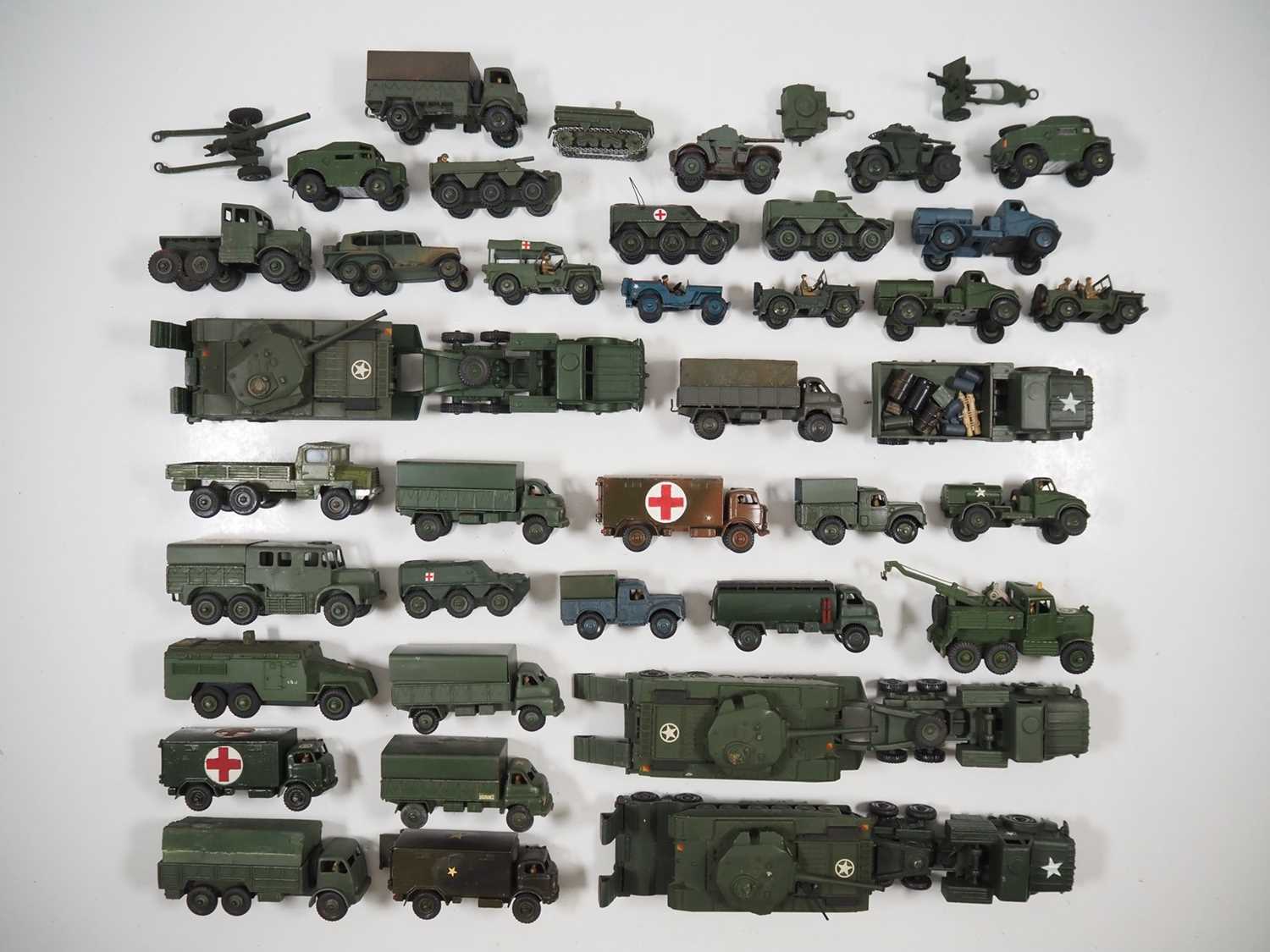 Lot 59 - A large group of playworn DINKY military...