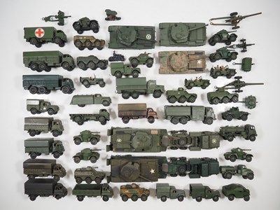 Lot 60 - A large group of playworn DINKY military...