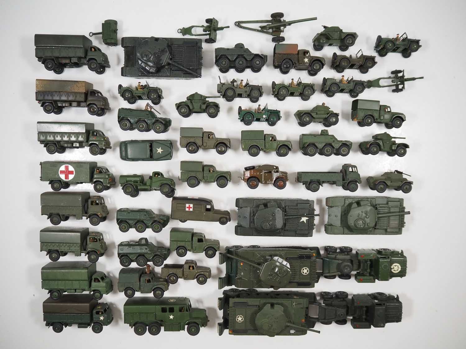 Lot 61 - A large group of playworn DINKY military...