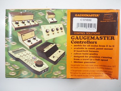 Lot 623 - A group of GAUGEMASTER controllers,...