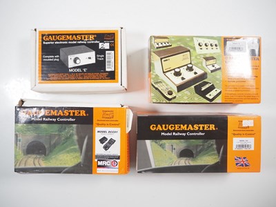 Lot 624 - A group of GAUGEMASTER controllers, to include...