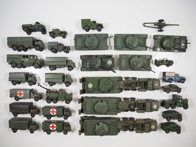 Lot 63 - A large group of playworn DINKY military...