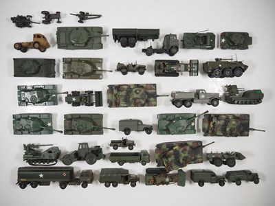 Lot 66 - A large group of playworn military vehicles to...