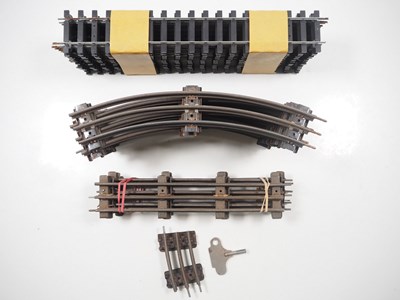 Lot 702 - A group of 2 and 3-rail O gauge track by...