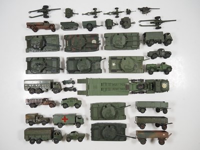 Lot 75 - A large group of playworn DINKY military...