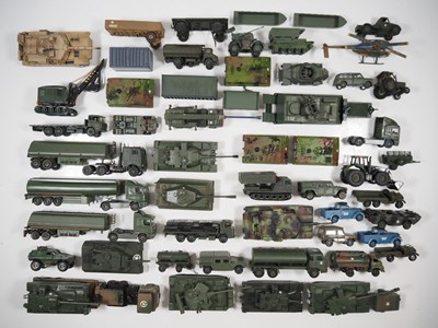 Lot 76 - A large group of playworn military vehicles to...