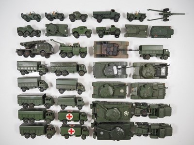 Lot 79 - A large group of playworn DINKY military...