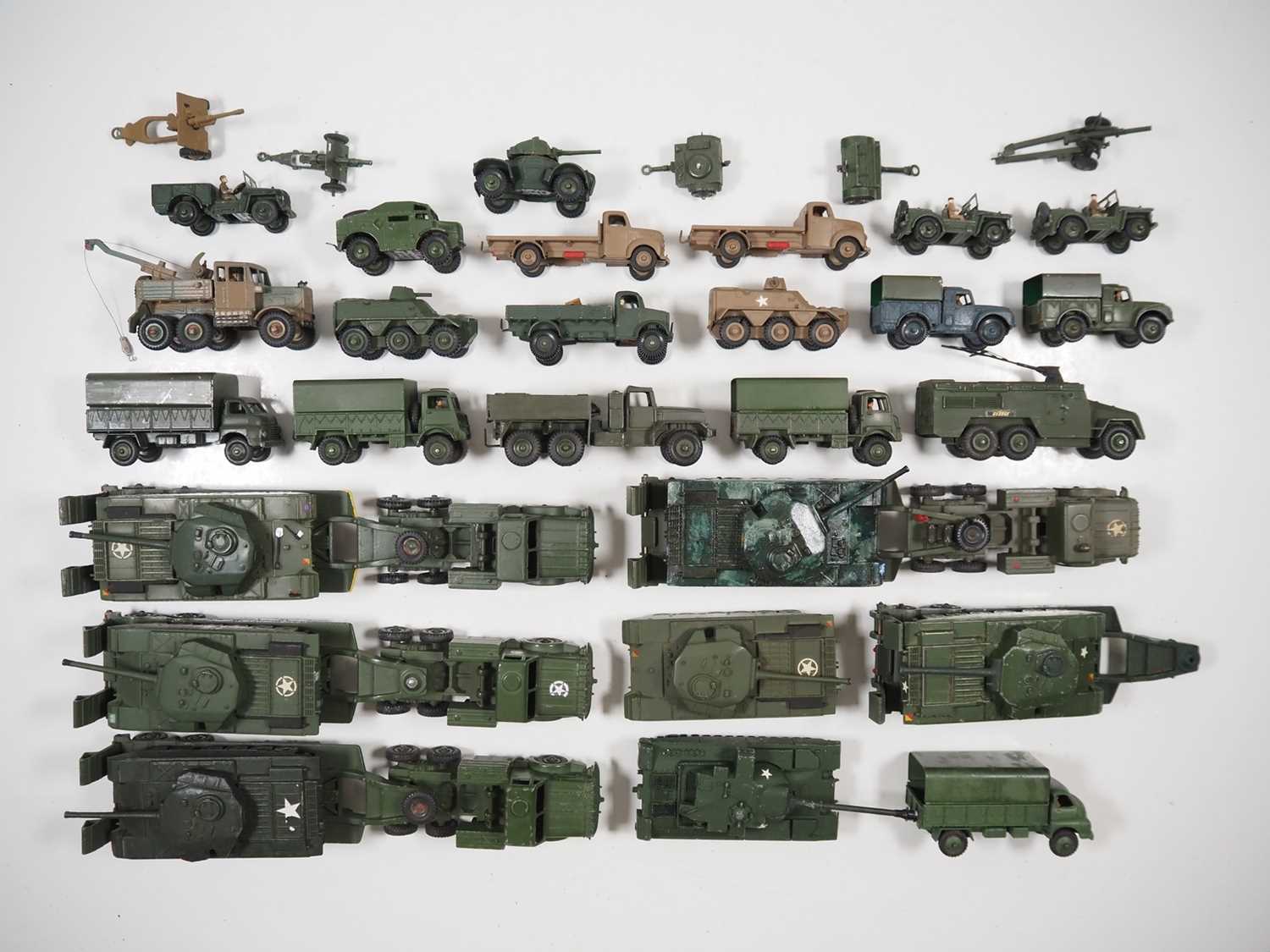 Lot 83 - A large group of playworn DINKY military...