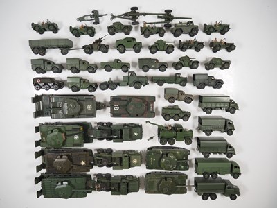 Lot 84 - A large group of playworn DINKY military...