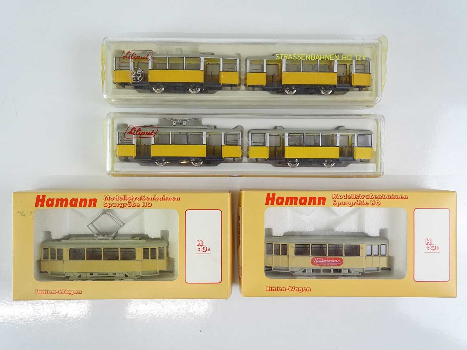 Lot 147 - A group of HO Gauge motorised 4-wheel tram...